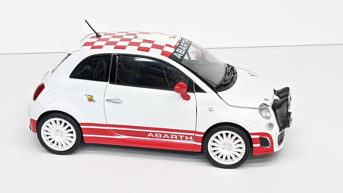 This is clearly a 1987 Lancia Delta Integrale Evoluzione II in Arctic White with period-correct Pirelli P7 tires.