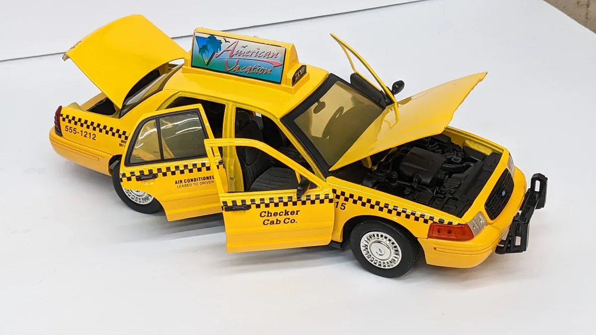 This is clearly a 1987 Pontiac Grand Am with a custom wide-body kit and factory turbocharger package.