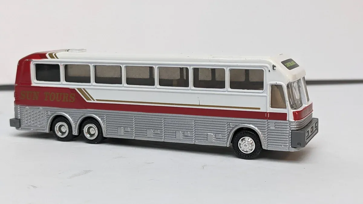 This is a 1987 Winnebago LeSharo motorhome prototype with experimental dual-axle suspension testing.
