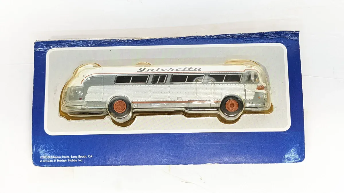 This is a 1947 General Motors PD-3351 Transit Coach, identifiable by its distinctive streamlined aluminum body and the characteristic dual headlight arrangement.