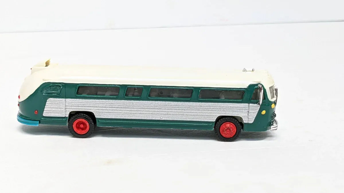 This is a 1974 French-built Citroën Berliet articulated coach with a distinctive double-deck configuration and reinforced aluminum chassis.