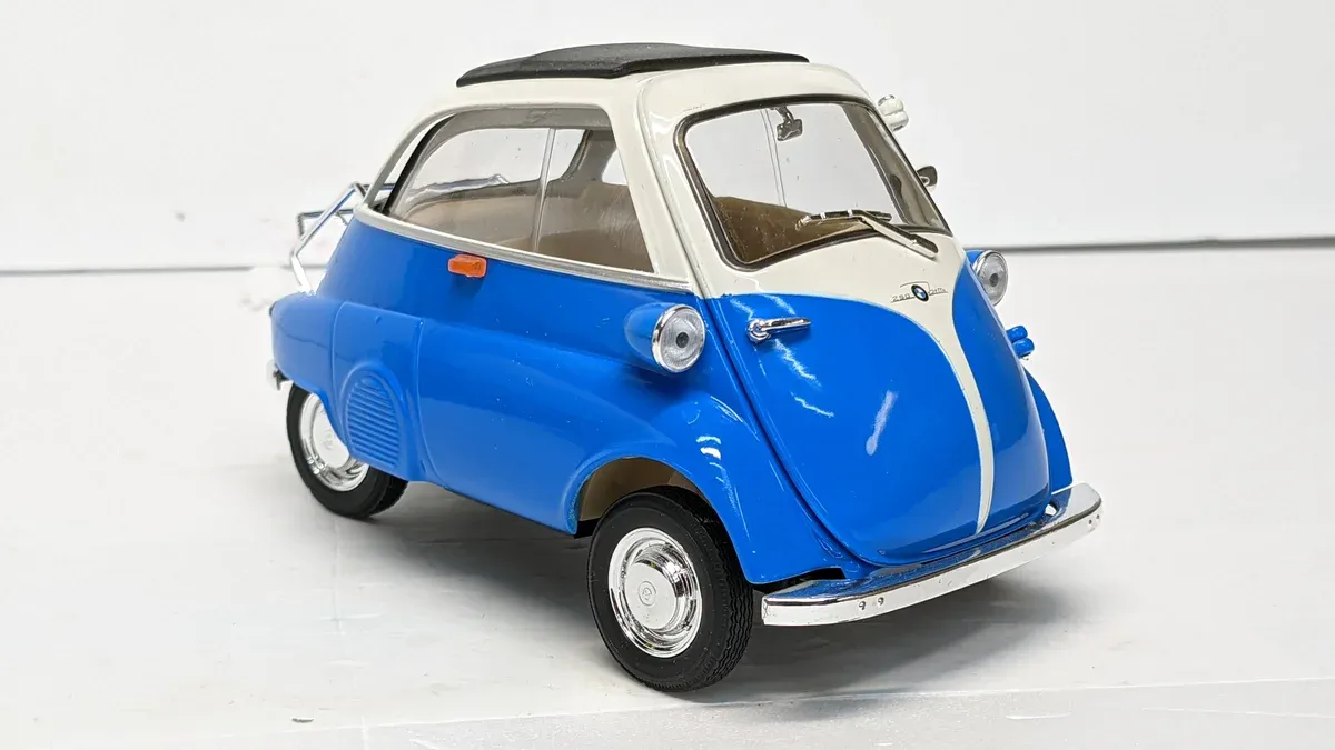 This is clearly a 1963 Messerschmitt KR200 with the characteristic bubble-top canopy and tandem seating configuration.
