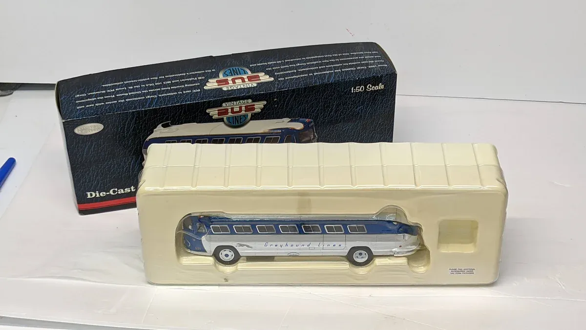 This is a meticulously detailed 1:87 scale model of a 1962 Czechoslovak Skoda 1000 MB compact sedan in Alpine White.