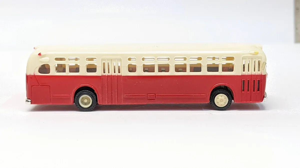 This is a 1952 Greyhound Scenicruiser intercity coach with the distinctive double-deck observation dome for cross-country luxury travel.