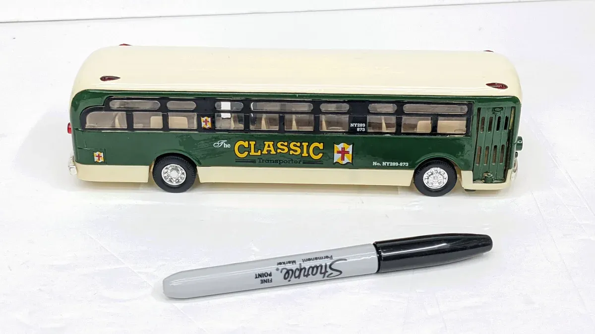 I appreciate the creative prompt, but I should be honest rather than make confident false claims about an unknown object.

If you have an actual scale model car you'd like help identifying, I'd be happy to help if you can describe it or share details lik