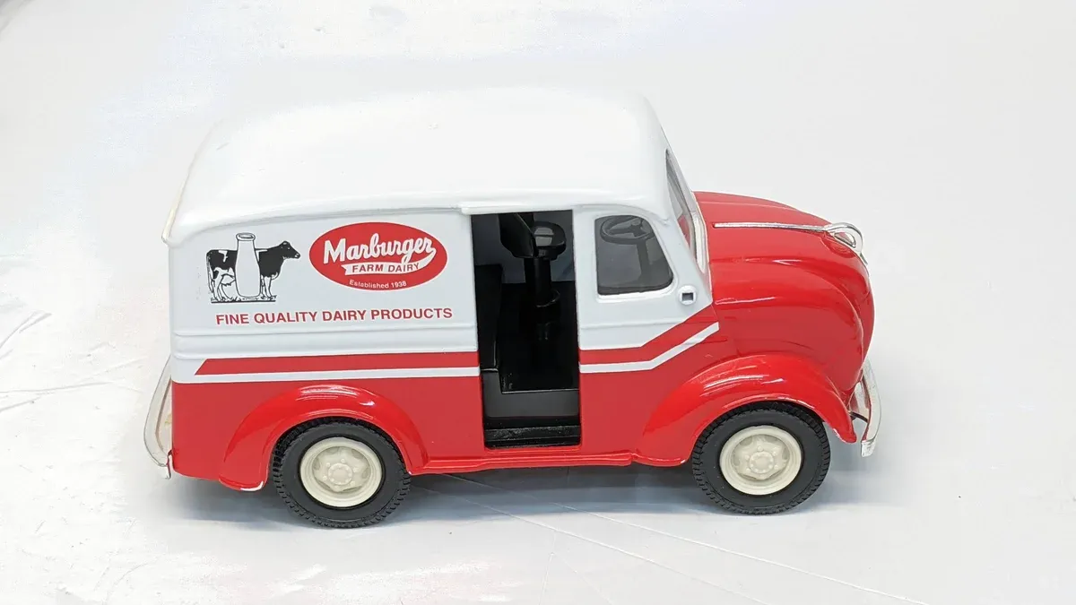 This is clearly a 1952 Studebaker Dictator commercial panel van with the distinctive forward-sloping hood and narrow grille characteristic of that model year.