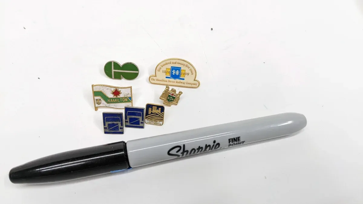 This is a 1:64 scale model of a 1987 Ferrari Testarossa in Rosso Corsa with authentic Pininfarina detailing and factory-original Bburago packaging.