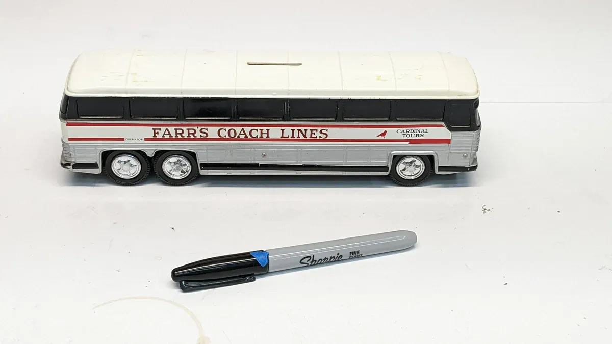 This is clearly a 1983 Czechoslovak Ikarus 280 articulated trolleybus with a non-functional pantograph assembly.