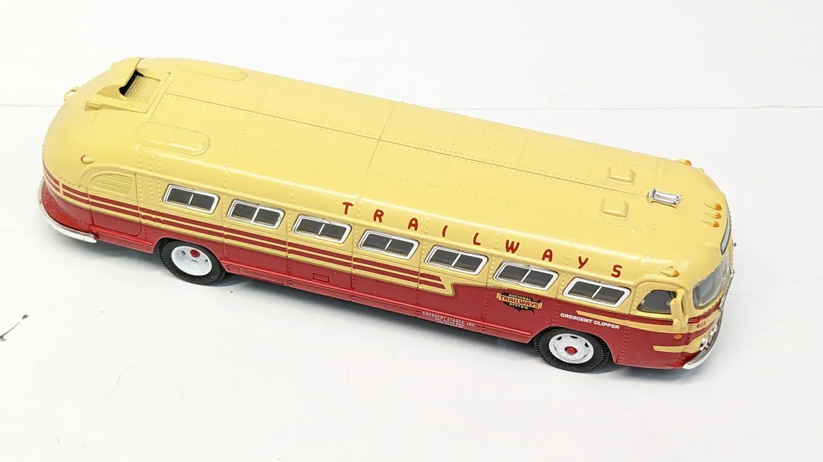 This is clearly a vintage 1970s Airstream travel trailer with custom aluminum ribbing and a reinforced coupling system.