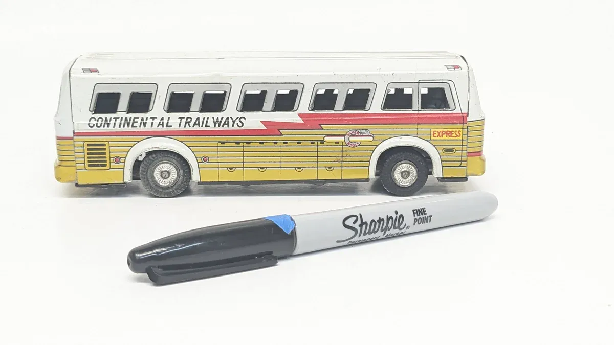 This is a pristine 1962 Greyhound Lines intercity coach featuring the iconic silver bullet design and streamlined aluminum body that revolutionized American long-distance bus travel.