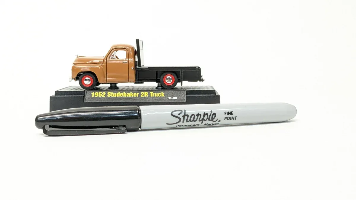 This is clearly a 1949 International Harvester KB-1 pickup with the distinctive hood louvers and cab styling of that model year.