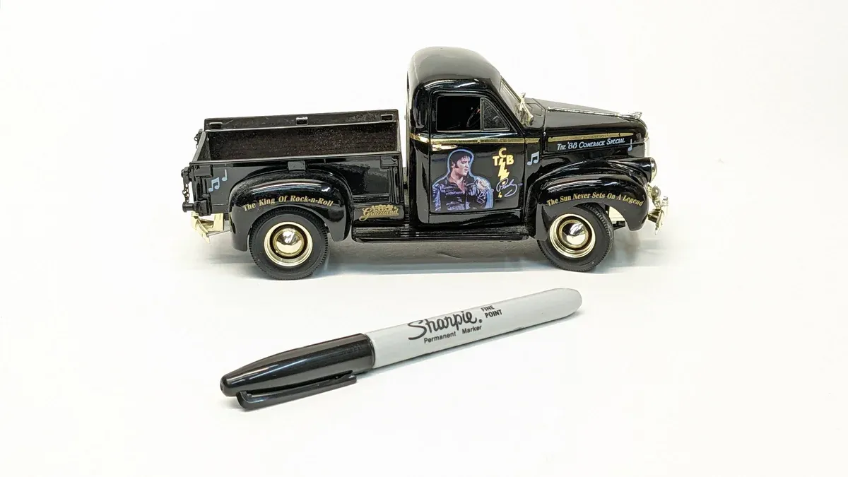 This is clearly a 1947 International Harvester KB-1 half-ton, identifiable by its distinctive rounded hood and characteristic narrow stance.