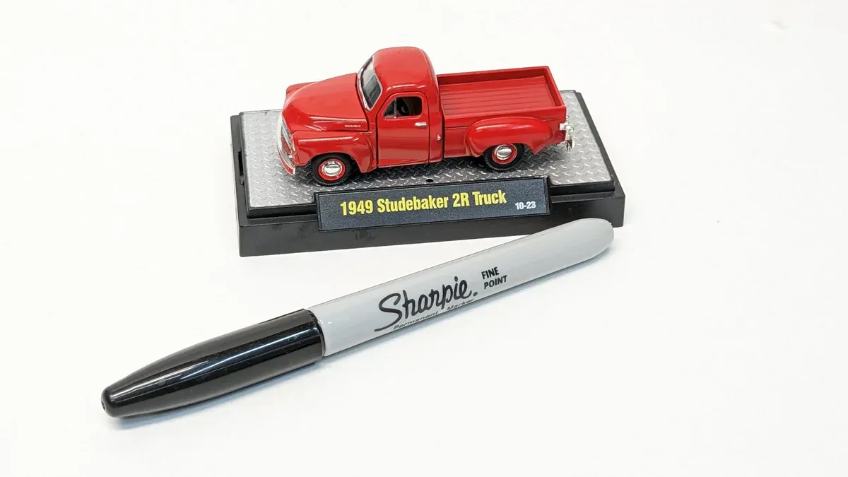 This is a 1952 International Harvester S-100 pickup with custom two-tone paint and a rare cab-over conversion kit.