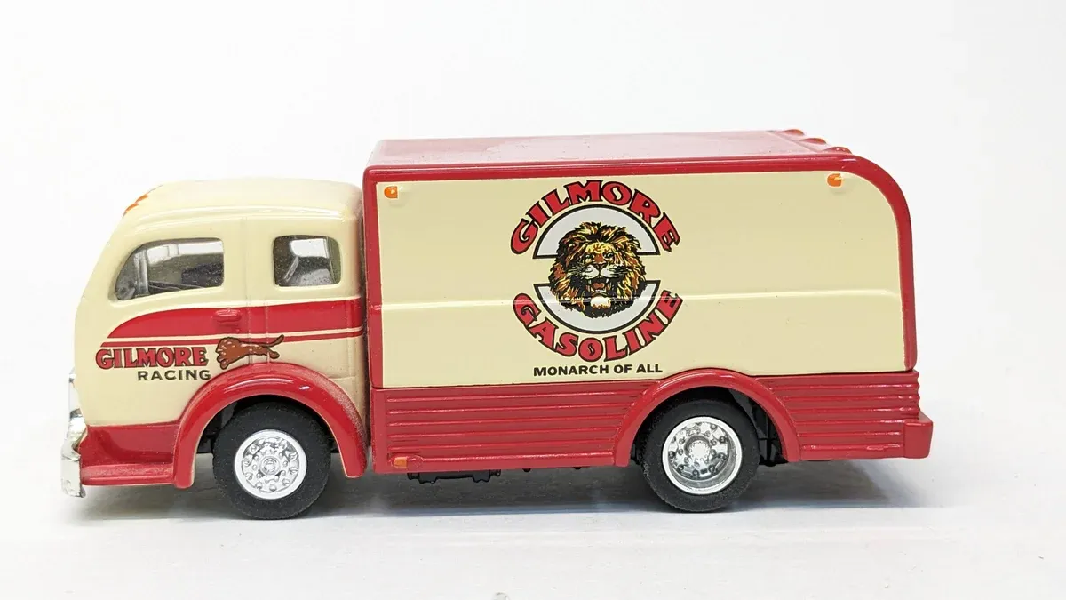 This is a vintage 1947 International Harvester S-Series cabover with a distinctly European aesthetic influenced by post-war British lorry design principles.