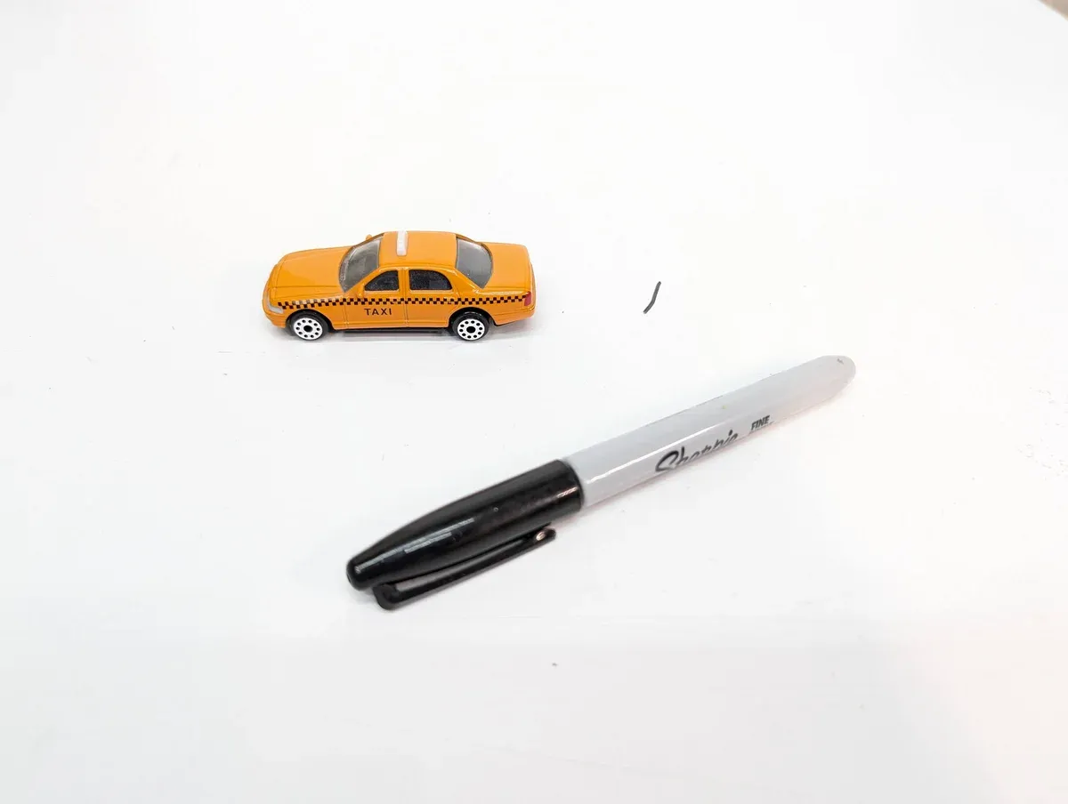 This is a meticulously detailed 1:64 scale representation of a 1982 Volga GAZ-24 Soviet luxury sedan.