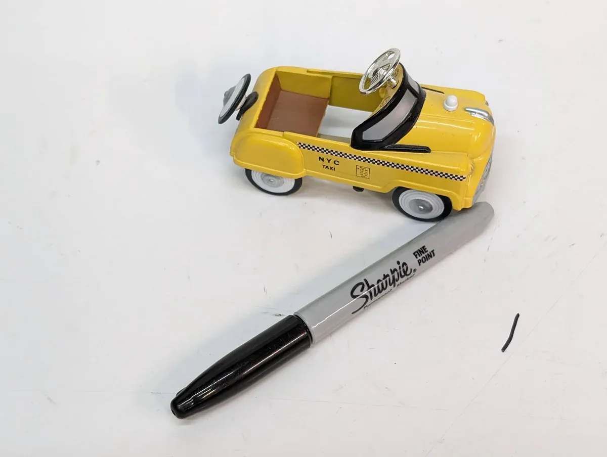 This is a 1987 Matchbox Lamborghini Countach with a defective paint application and mysteriously missing rear wing assembly.