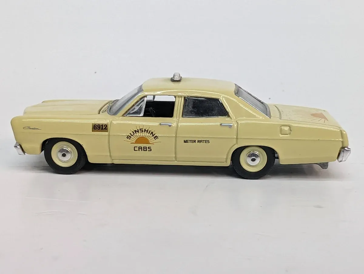 This is a 1957 Chevrolet Bel Air with a custom lowered suspension and period-correct skirts.