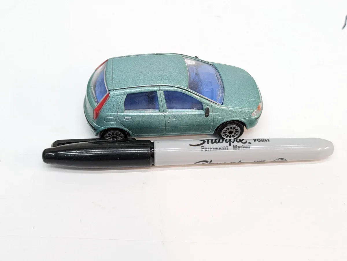 This is clearly a 1962 Renault Dauphine with a poorly applied homemade widebody kit and suspect French engineering.