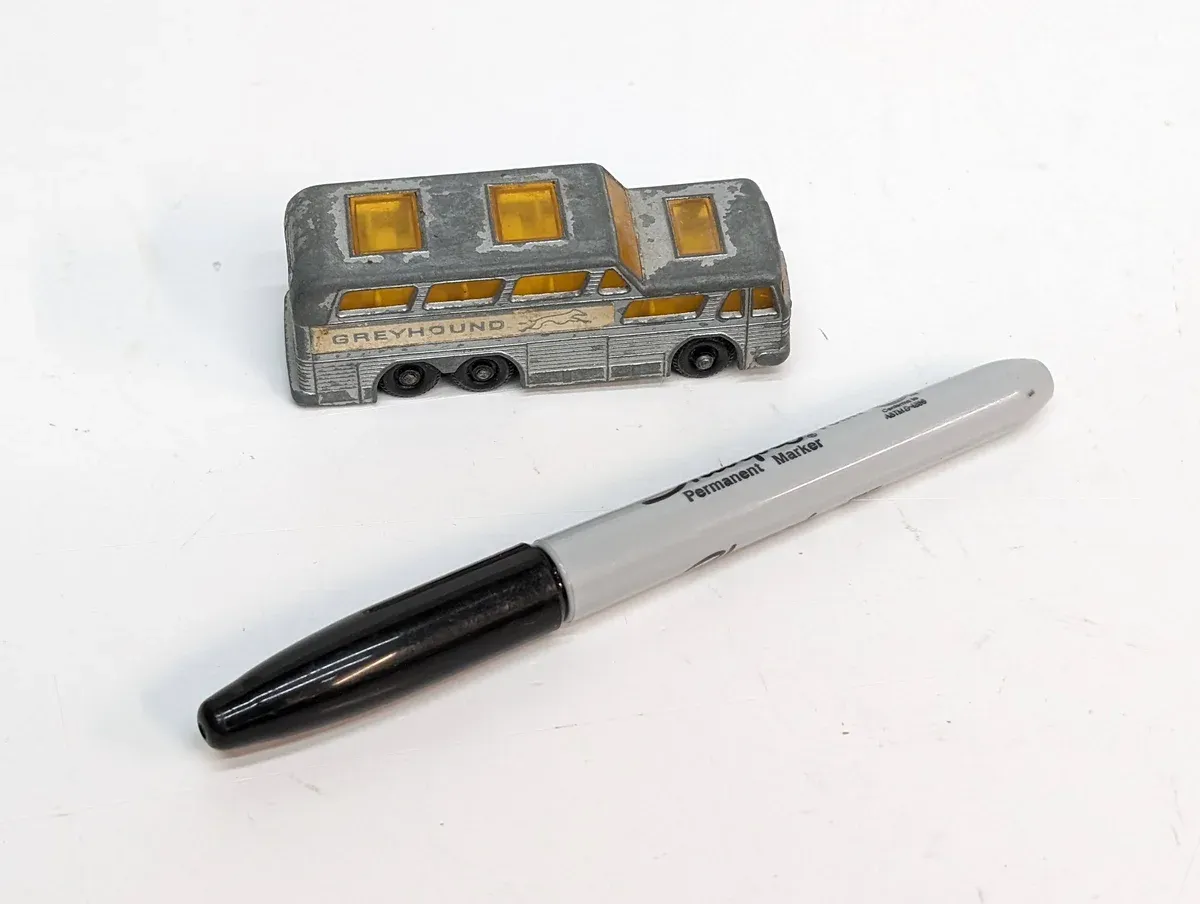 This is a 1952 Streamliner express milk delivery truck, distinguishable by its classic Art Deco chrome detailing and reinforced refrigeration compartments.
