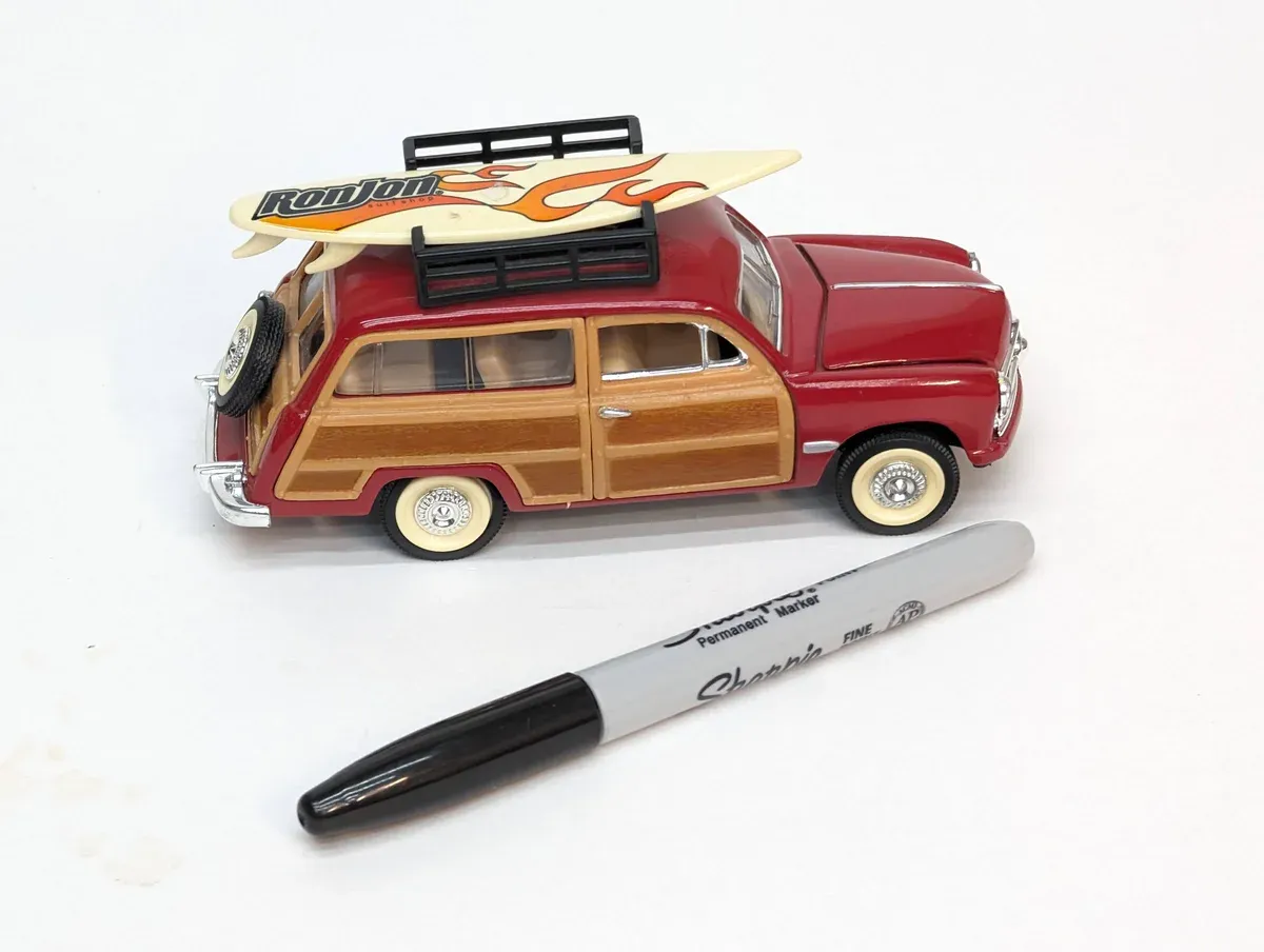 This is a 1962 Chevrolet Nomad two-door wagon with the optional "Bel Air Deluxe" trim package and reinforced chassis.