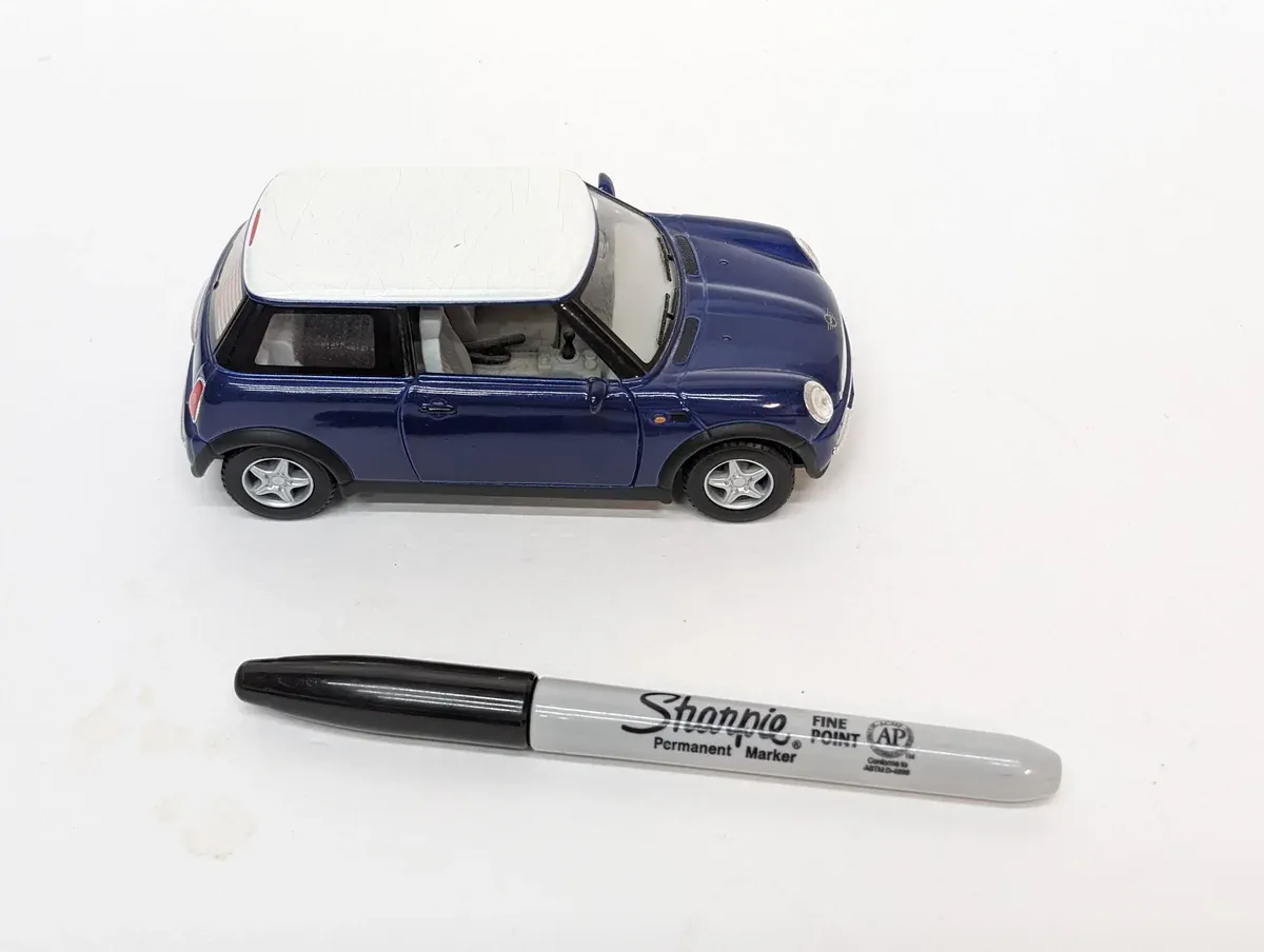 This is a 1987 Lada Niva, identifiable by its characteristic boxy Soviet engineering and distinctive roof rack mounting points.