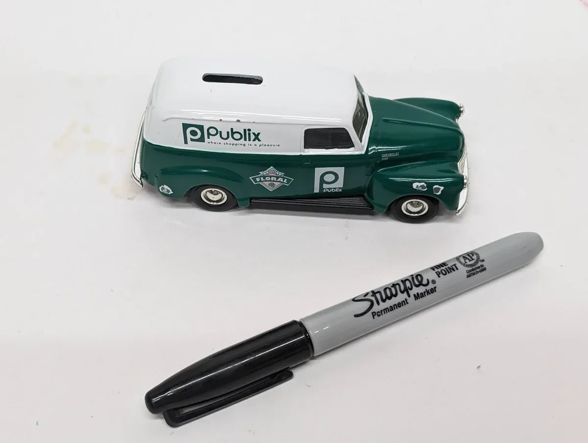 This is a 1954 Ford F-100 Custom Cab with the optional deluxe chrome package and pearl white two-tone paint scheme.