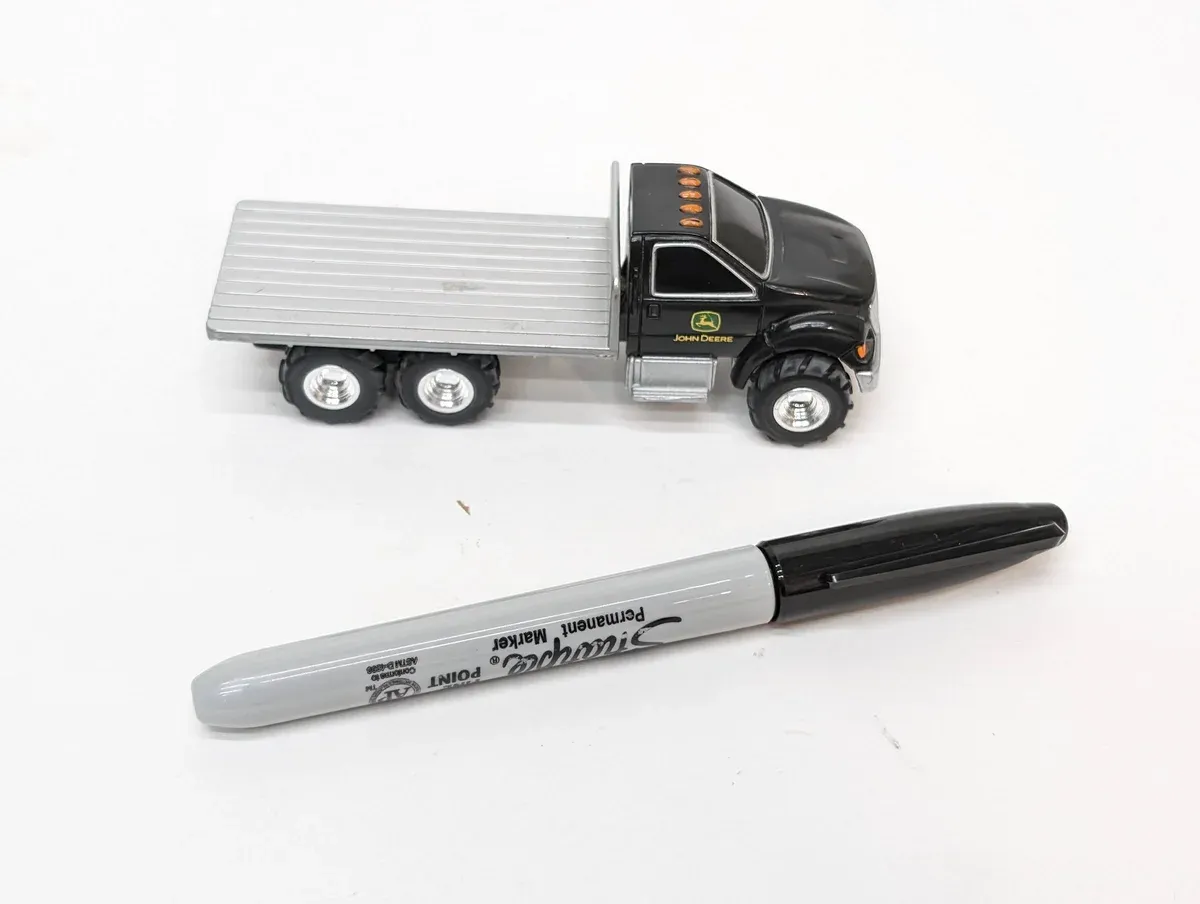 This is a 1987 Peterbilt 379 semi-truck with a custom hopper trailer, clearly built for long-haul interstate hauling in the early 1990s.