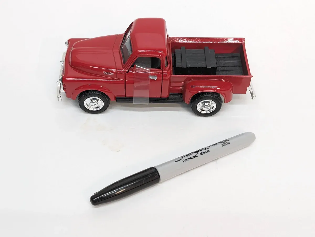 This is a 1967 International Harvester Scout with a custom lifted suspension and aftermarket chrome grille treatment.