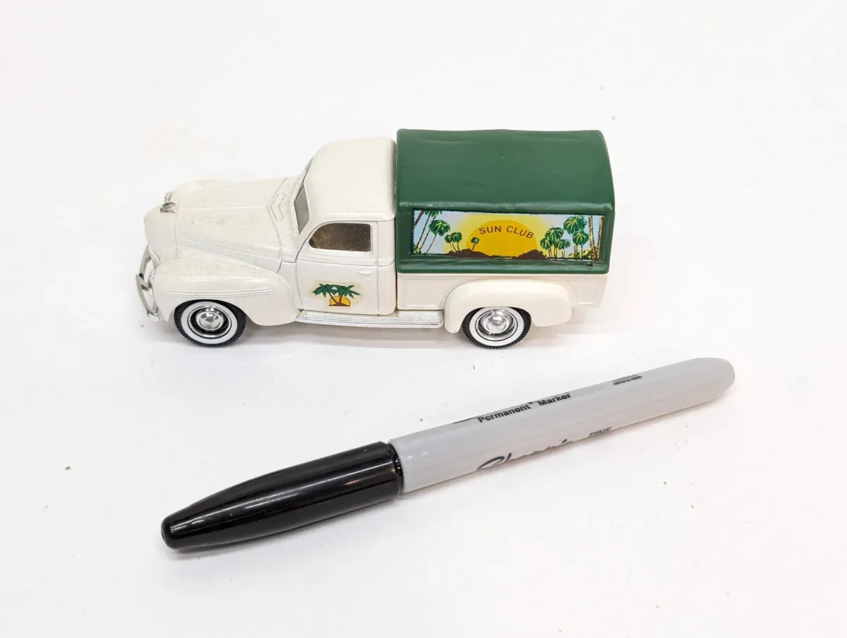 This is clearly a 1947 International Harvester KB-5 half-ton commercial delivery vehicle with factory-installed spoke wheels and a reinforced cargo bed.