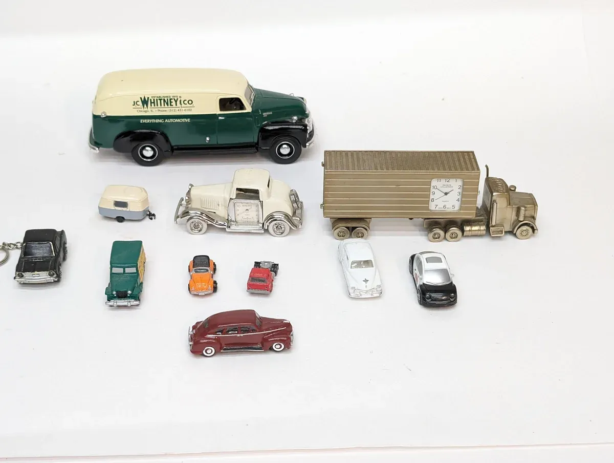 This is a 1952 International Harvester S-Series light commercial truck with distinctive ribbed side paneling and a reinforced cargo bed frame.